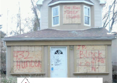 Building boarded up and graffitied